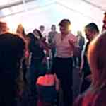 A group of students are gathered at a party venue